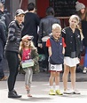 Bec Hewitt looks tense as she steps out with her three children in ...