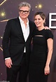 Colin Firth cosies up to girlfriend Maggie Cohn as they make their red ...