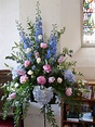 Traditional pedestal arrangement | Floral wreath, Floral, Arrangement