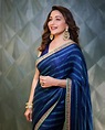 Madhuri Dixit looks effortlessly graceful in a blue saree!