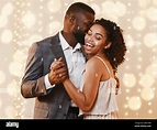 Beautiful happy black couple dancing in modern restaurant Stock Photo ...