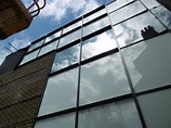 Aluminium curved curtain walling installed in listed building