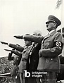 Image of German Fuhrer Adolf Hitler takes the salute at the Berlin