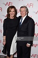 Anne Sweeney and business executive Robert A. Daly attend the 15th ...