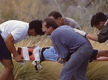 Then Mayor of Palm Springs, Sonny Bono, assisting the injured in 1991 ...