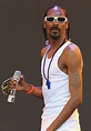 Glimpse at Snoop Dogg's 3 Tattoos — Touching Meanings behind 2 of Them