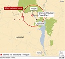 Chernobyl fire under control, Ukraine officials say - BBC News
