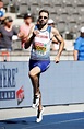 Defending champion Martyn Rooney makes hard work of 400m heat at ...