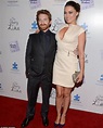 Little and large! Seth Green is towered over by wife Clare
