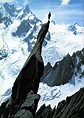 Gaston Rébuffat atop the aiguille du Roc, Mont Blanc massif, France; ca ...