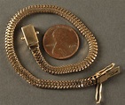 Lot 179: Tiffany 14K serpentine bracelet | Case Auctions