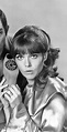 Barbara Feldon as the sexy 'Agent 99', makes a call on her shoe phone ...