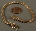 Lot 179: Tiffany 14K serpentine bracelet