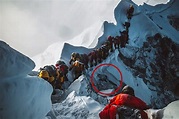 Mount Everest climbers seen queuing past dead body on peak that has ...