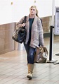 EXCLUSIVE: "Baywatch" actress Erika Eleniak is seen at the airport in ...