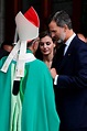 Spain's King Felipe VI (R) and Spain's Queen Letizia (C) speak with ...