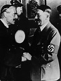 Adolf Hitler greets Neville Chamberlain upon the British Prime Minister ...