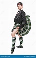 Hombre Escocés En Traje Nacional Tradicional Con La Falda Escocesa Que ...
