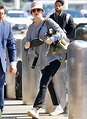 Pregnant Kaley Cuoco shows off her belly at LAX as she expects first ...