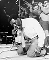 Soul singer Otis Redding passionately gets down on his knees with his ...