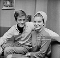 American actor Peter Fonda and his wife, Susan Brewer, sit smiling ...