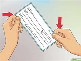 Cómo detectar un cheque falso: 14 Pasos (con imágenes)
