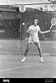 Dr. Richard Raskind prepares to return the ball during a tennis match ...