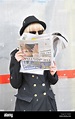 Spies spying girl hiding behind upside down newspaper espionage Stock ...