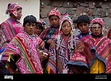 Portrait of young Quechua boys at Pisac in traditional colorful dress ...