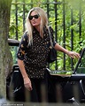 Kate Moss enjoys a relaxing drive through London in her vintage Porsche ...