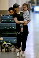 Anne Hathaway Out with Her Son Jonathan Arrives at JFK Airport in New ...