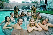 Friends relaxing in hot tub - Stock Photo - Dissolve
