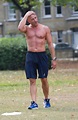 Radio presenter Toby Anstis works out topless after transforming ...