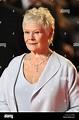 Dame Judi Dench arrives at the Royal World premiere of Skyfall at the ...