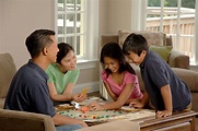 File:Family playing a board game (2).jpg - Wikimedia Commons