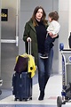 Anne Hathaway sweetly carries son Jonathan as she strolls through ...