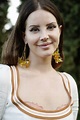 Lana Del Rey sizzles in plunging yellow top as she teases single 'Tulsa ...