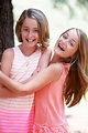 "Twin Sisters Hugging And Laughing" by Stocksy Contributor "Dina Marie ...