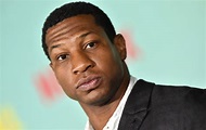 Jonathan Majors appears in court over assault charges, trial date set ...