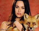 Megan Fox poses with animals