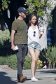 Lily Collins and Charlie McDowell wrap arms around each other while out ...