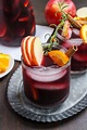 Easy Fall Sangria Recipe with apple cider + bourbon | Enjoy Iced or Hot