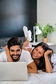 Happy Young Man and Woman is Having Fun in Bed Together Stock Photo ...