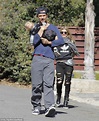 Doting dad Josh Duhamel cuddles son Axl on family outing with Fergie ...