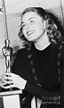 Ingrid Bergman Holding Oscar Award by Bettmann