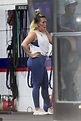 hilary duff flaunts her curves in a workout top and leggings during a ...