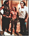 Arnold Schwarzenegger standing between Wilt "The Stilt" Chamberlain and ...