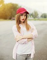 Pretty Young Girl Wearing a Shirt and Red Cap Stock Photo - Image of ...