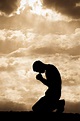 Kneeling In Prayer Stock Photos, Pictures & Royalty-Free Images - iStock