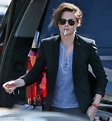 Kristen Stewart puffs on a cigarette as she shows off a new look ...